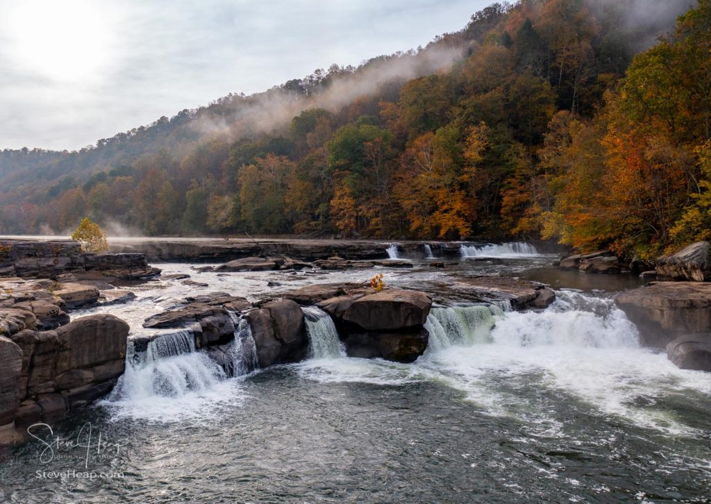 Valley Falls State Park near Fairmont in West Virginia on a colorful misty autumn day with fall colors
