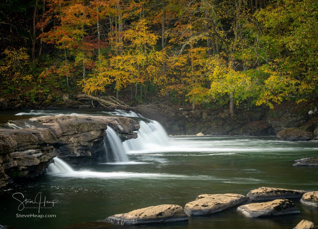 Valley Falls State Park near Fairmont in West Virginia on a colorful misty autumn day with fall colors on the trees