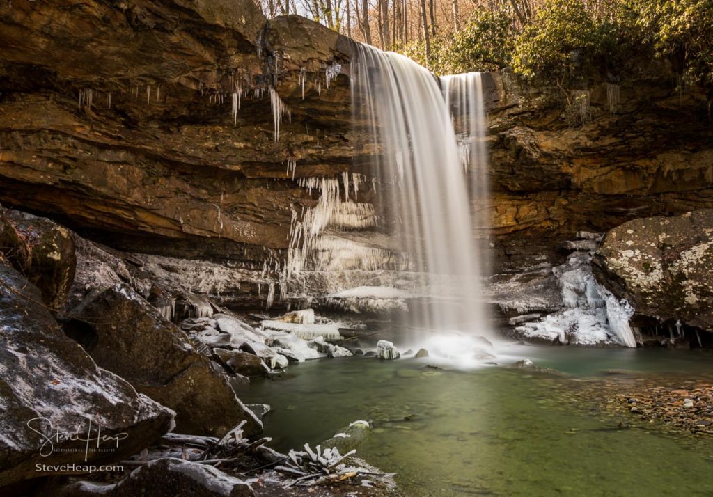 Icy water around the base of Cucumber Falls in the Ohiopyle state park in Pennsylvania in winter. Prints available here in my online store