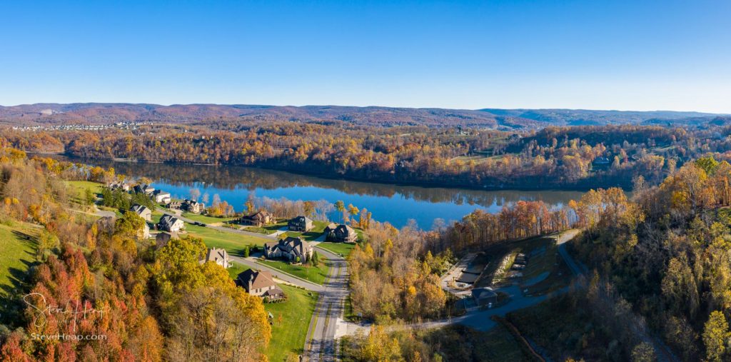Aerial drone panorama of the Woods of the Summit by Cheat Lake near Morgantown in autumn