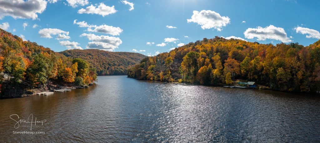 Cheat River entering the Cheat Lake near Morgantown, West Virginia, during a brilliant fall season