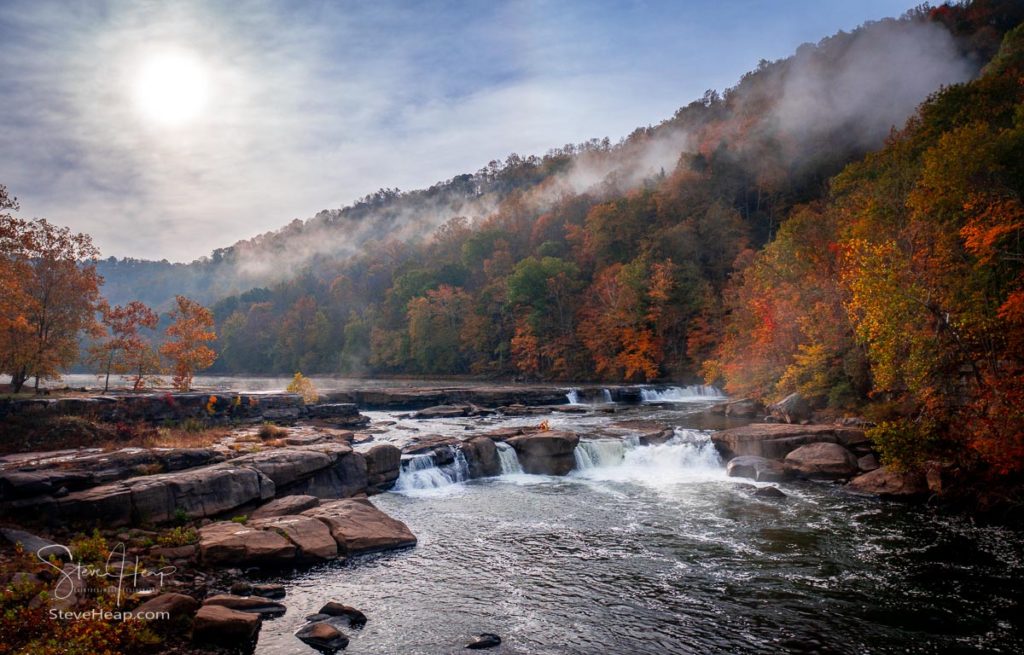 Valley Falls State Park near Fairmont in West Virginia on a colorful misty autumn day with fall colors on the trees. Prints available in my store