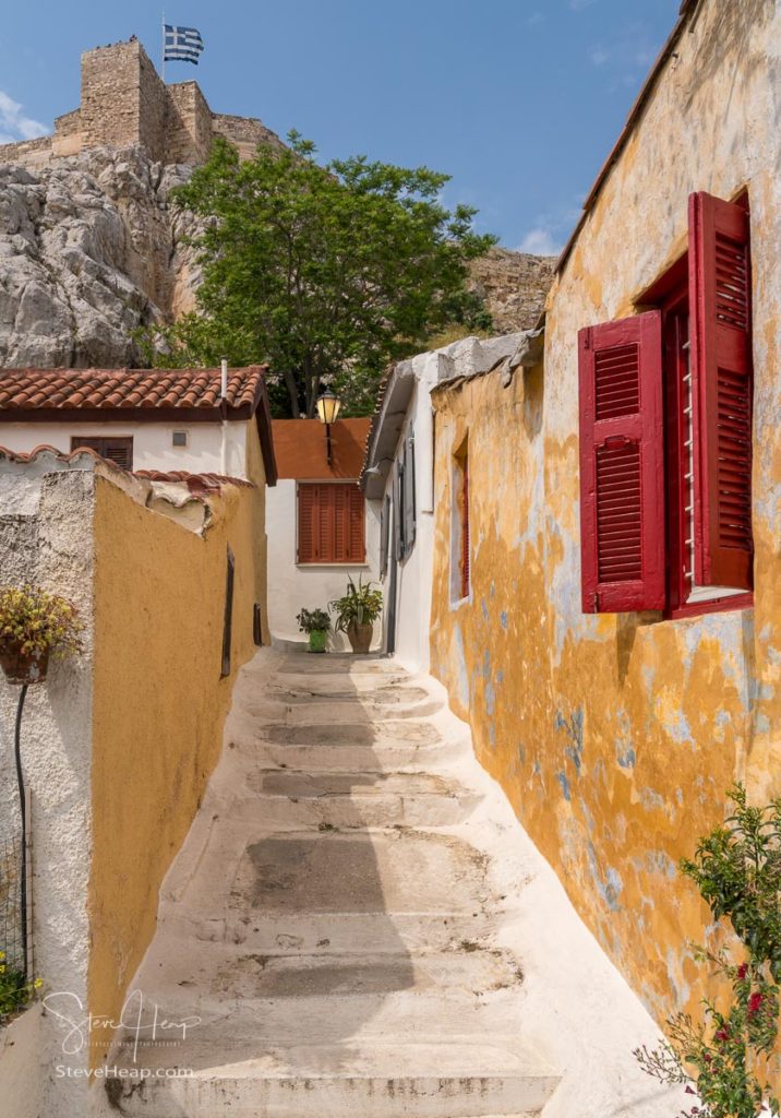 Narrow steps in ancient neighborhood of Anafiotika in Athens by the Acropolis. Prints available here in my store