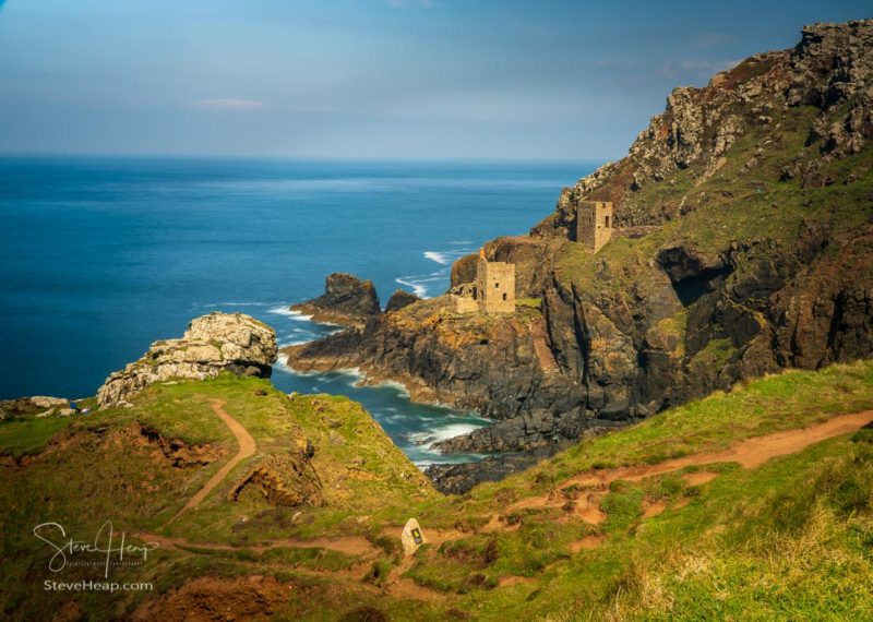 Long exposure image of the historic remains of the old engine house and shaft at Botallack tin mine on coast in Cornwall