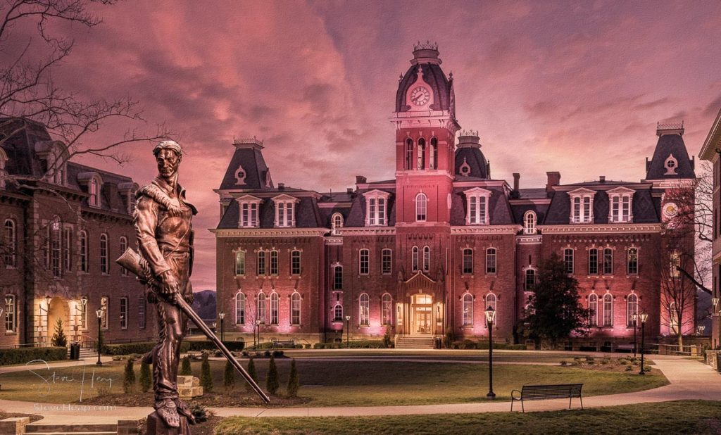 Dramatic sepia shaded image of Woodburn Hall at West Virginia University or WVU in Morgantown WV with the famous Mountaineer statue composited into the photo. Perfect for a graduation gift for a student or for the wall of a faculty office