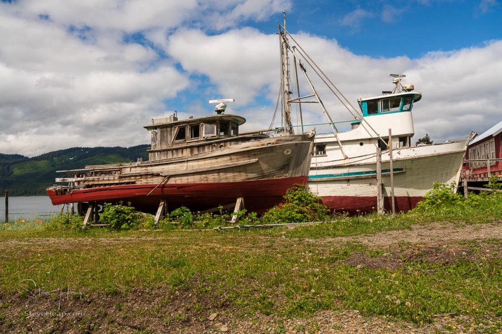 Two small, abandoned fishing boats on the waterside at Icy strait Point near Hoonah. Prints available in my online store