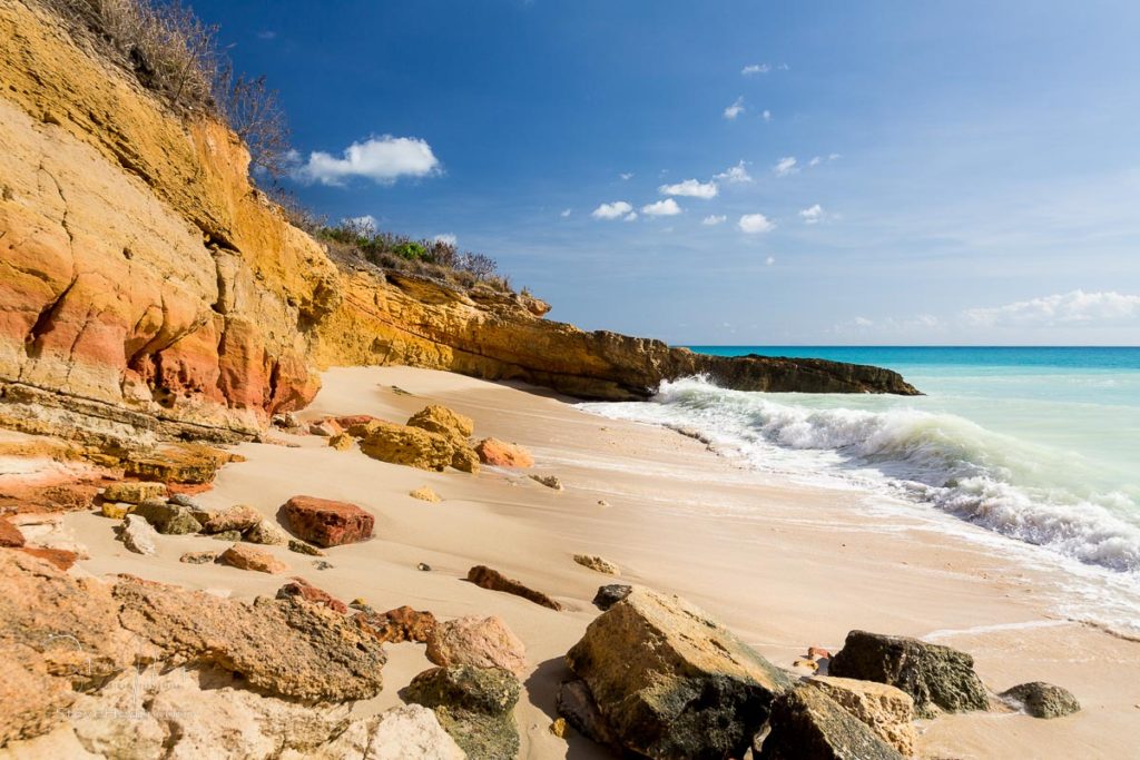 Sandstone cliffs frame Cupecoy Beach on Sint Maarten St Martin Caribbean. Prints available here