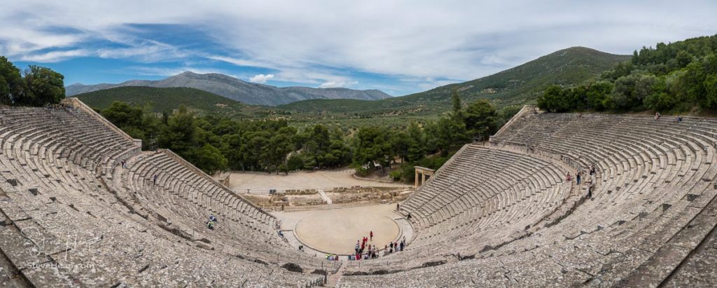 Tourists in theater of the Sanctuary of Asklepios at Epidaurus