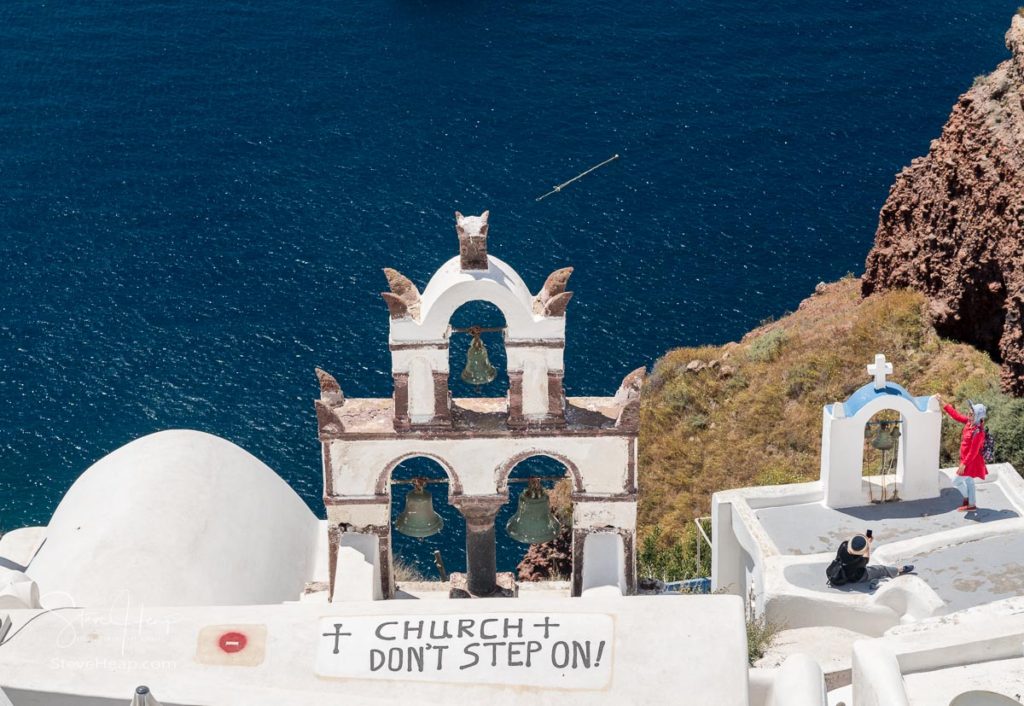 SANTORINI, GREECE - 18 MAY 2019: Do not step on roof sign in village of Oia on Santorini