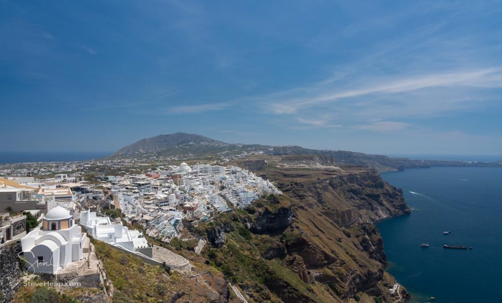 View down the island towards the bigger town of Fira on Santorini