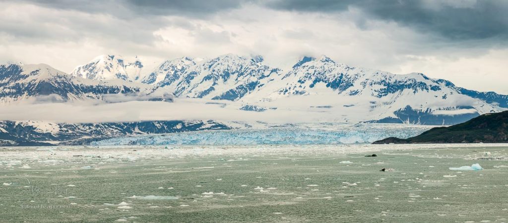 Wide view of the famous Hubbard Glacier as it enters the ocean on the Alaskan coast south of Valdez