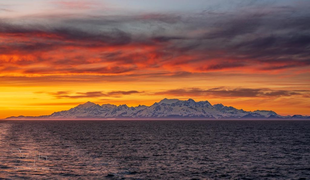 Late evening sunset on panorama of mountains and Mount Fairweather by Glacier Bay National Park in Alaska. Prints in my online store