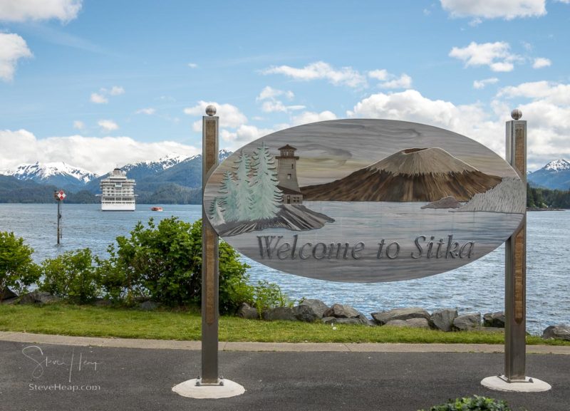 Sitka, AK - 8 June 2022: Viking Orion cruise ship behind Welcome to Sitka sign in Alaska