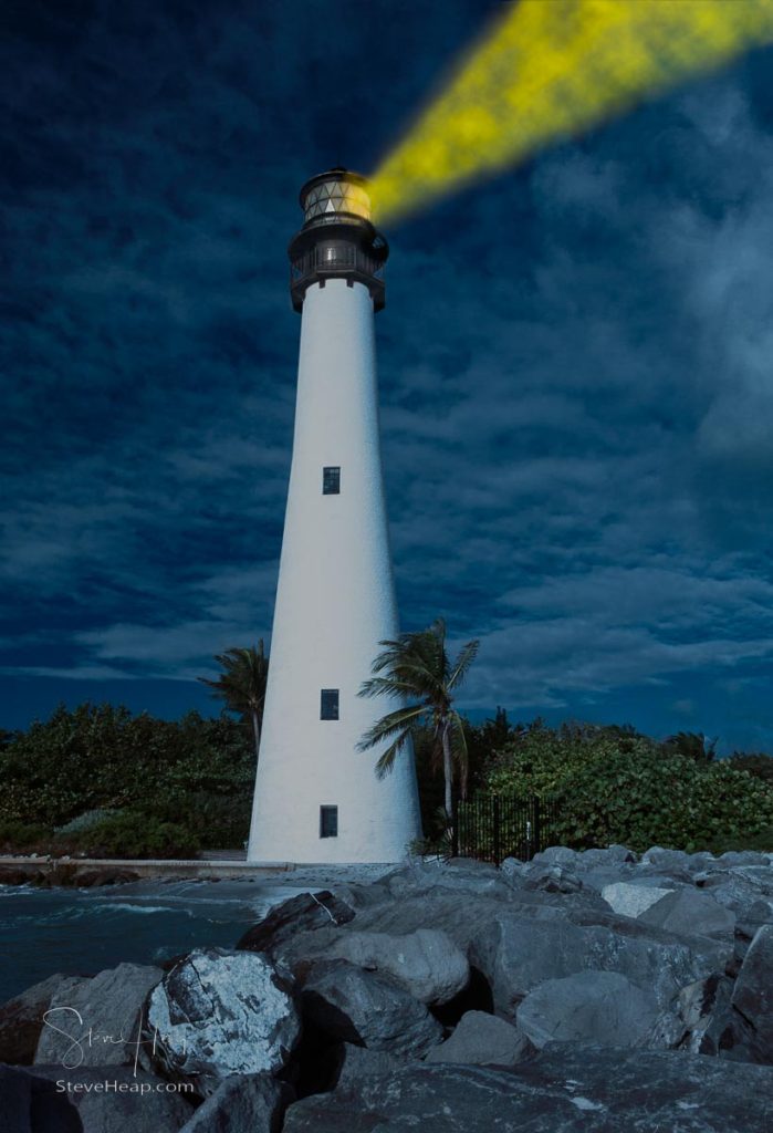 Cape Florida Lighthouse and Lantern in Bill Baggs State Park in Key Biscayne Florida with light glowing at night. Prints here
