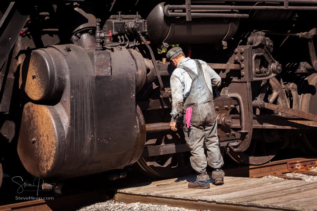 Western Maryland Railroad steam train being maintained in the fall of 2011. This scenic railroad offers excursions pulled by a 1916 Baldwin locomotive between Cumberland and Frostburg. Prints available here