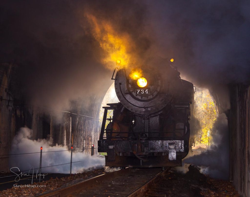 Old 1916 Baldwin steam train on WMRR pulling into a tunnel belching steam and smoke. Prints available in my store