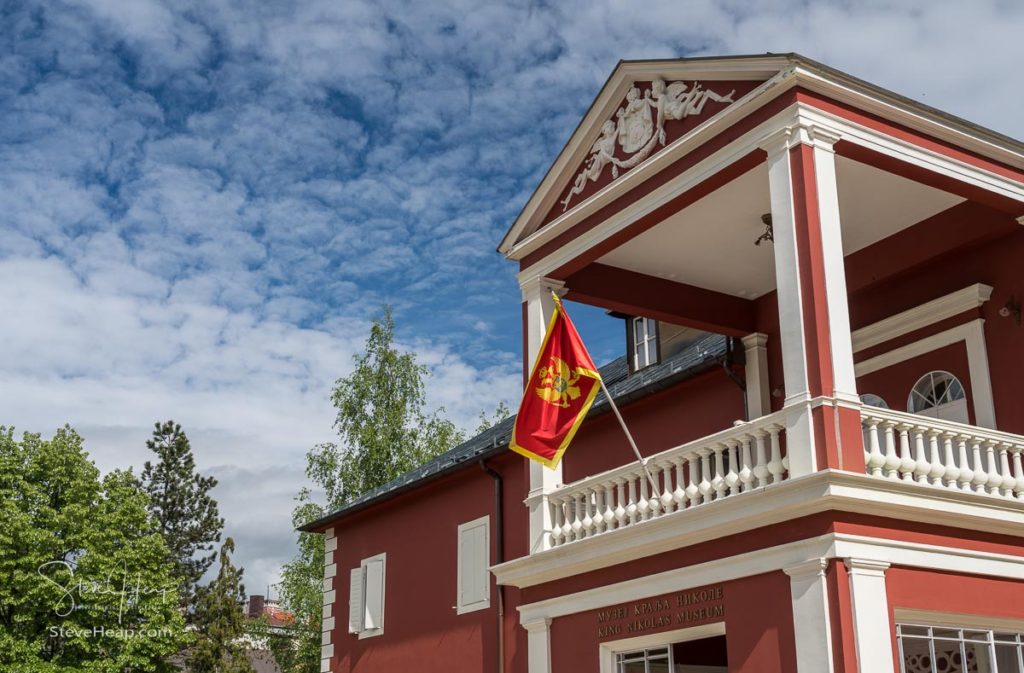 Flag of Montenegro flies outside the home of King Nikola in Cetinje near Kotor
