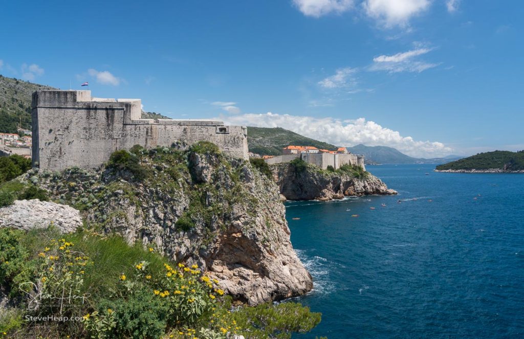 Panorama of the cliffside under Fort Lawrence and city walls of the old town in Dubrovnik