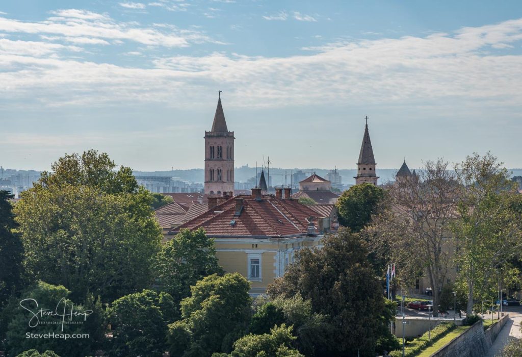 Ancient buildings and tower in the old town by the port of Zadar in Croatia