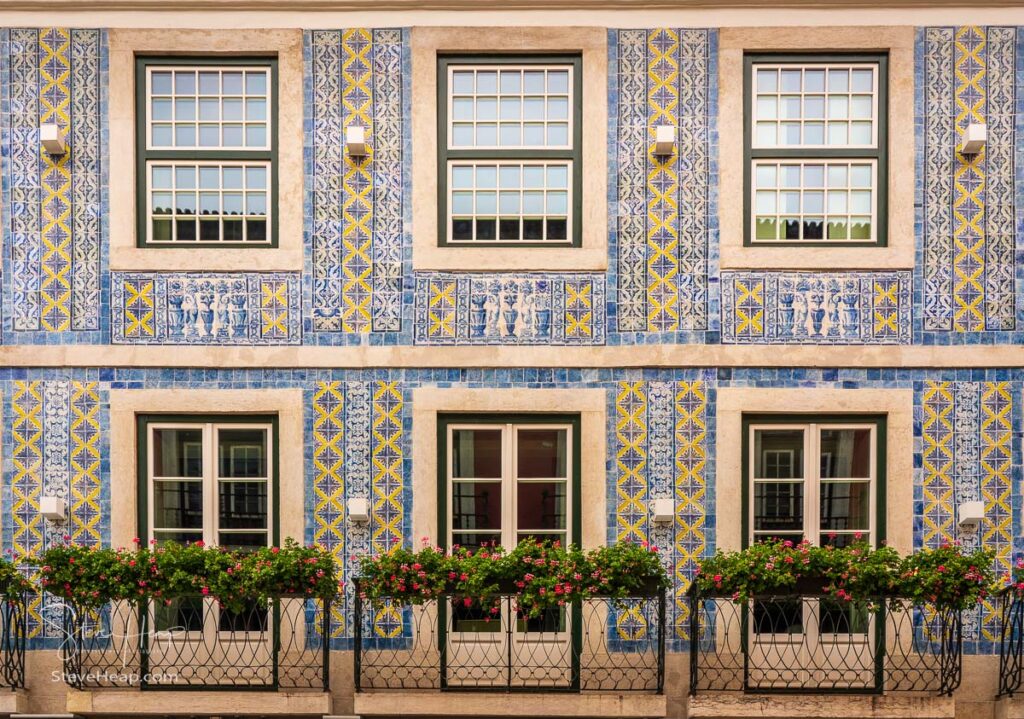 Decorative ceramic tiles on a large house with balconies in downtown Lisbon, Portugal. Prints available in my store