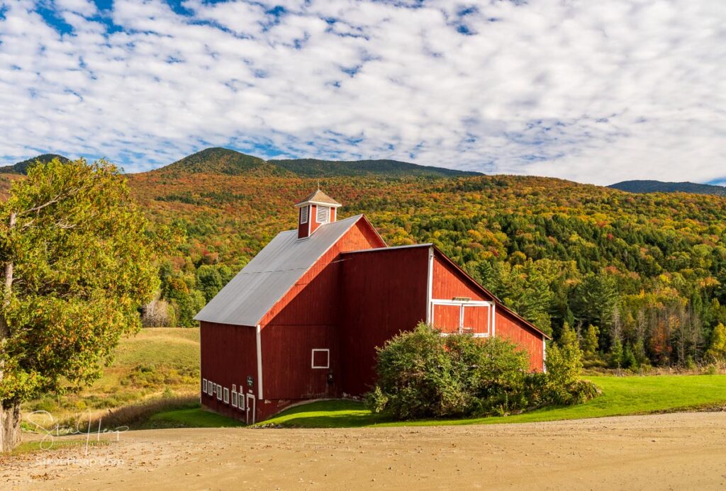 Grandview farm barn by the side of the track near Stowe in Vermont during the autumn color season. Prints available in my store