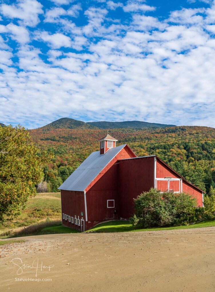 Grandview farm barn by the side of the track near Stowe in Vermont during the autumn color season. Prints available in my store