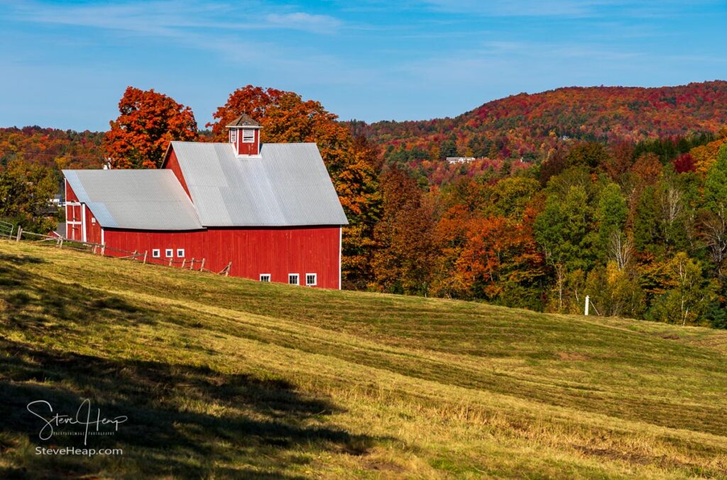 Grandview farm barn by the side of the track near Stowe in Vermont during the autumn color season. Prints in my online store