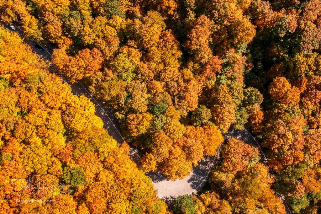 Drone aerial view of the narrow hairpin bend in the road through Smugglers Notch in the fall. Prints available in my store