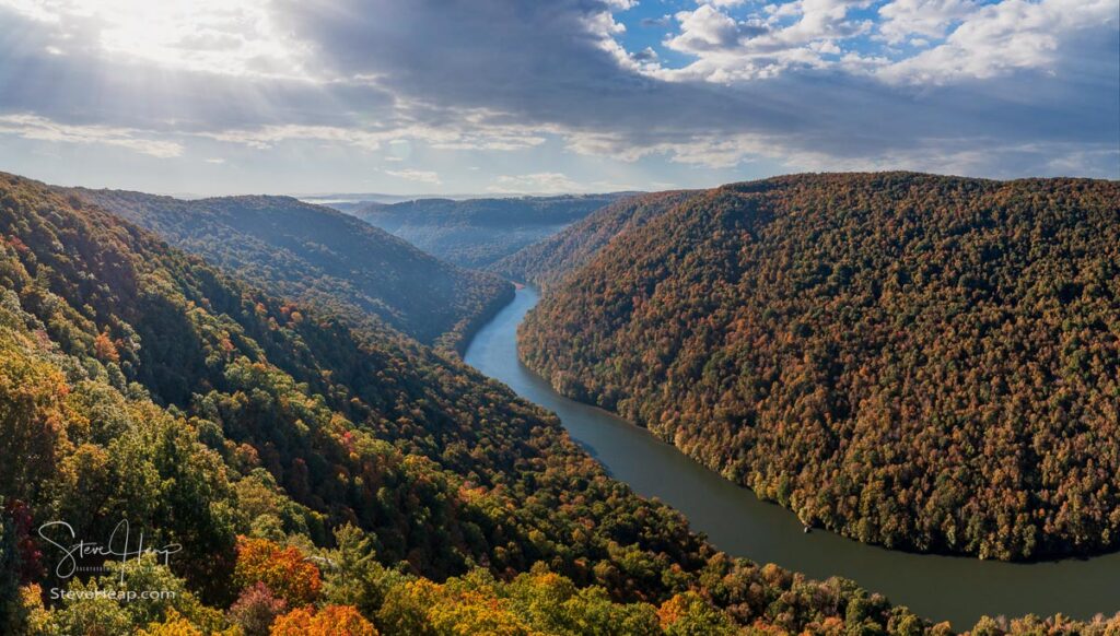 View up the Cheat River in narrow wooded gorge in the autumn. Coopers Rock Forest is near Morgantown, West Virginia. Prints in my store