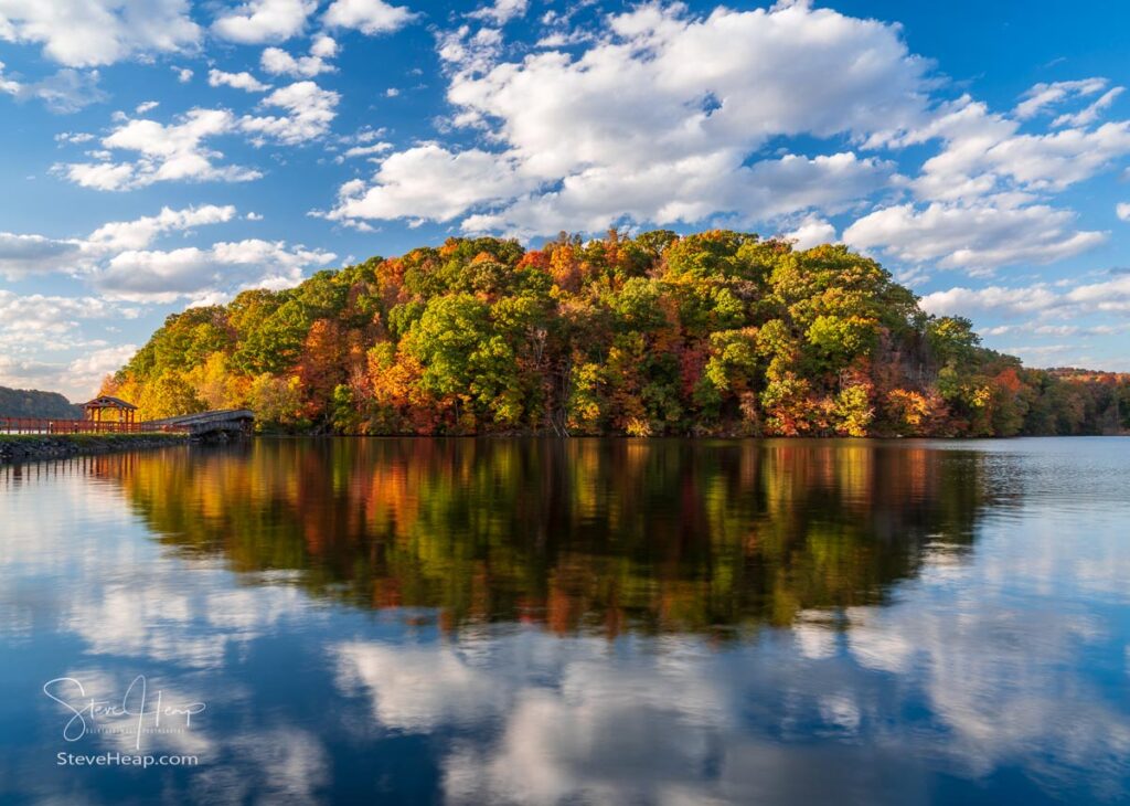 Warm light on the park at Cheat Lake near Morgantown West Virginia on a beautiful calm autumn evening. Prints in my store