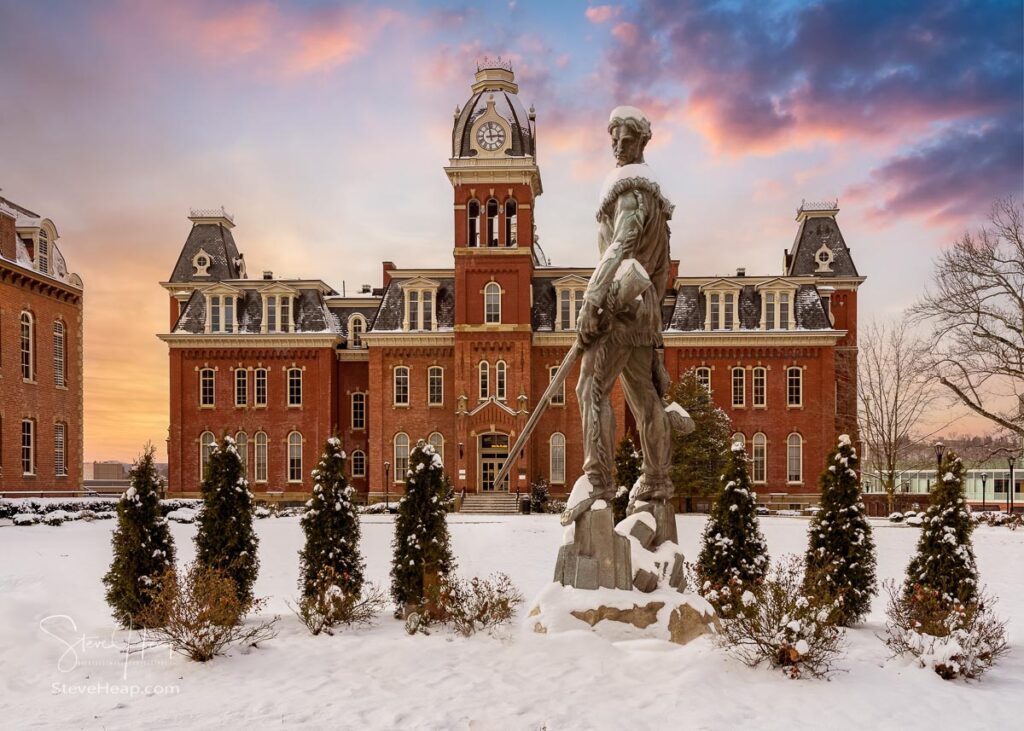 Famous WVU mascot, The Mountaineer, surveys the historic Woodburn Hall. A composite of the statue into position in the gardens. Prints available in my store