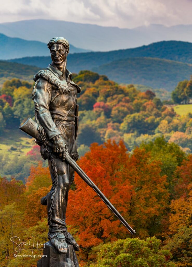 Famous WVU mascot, The Mountaineer, surveys the dramatic fall colors of the West Virginia mountains. Perfect graduation gift for a graduating student from the university