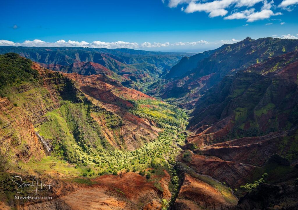 Aerial view of Waimea Canyon and landscape of Hawaiian island of Kauai from helicopter flight. Prints available here
