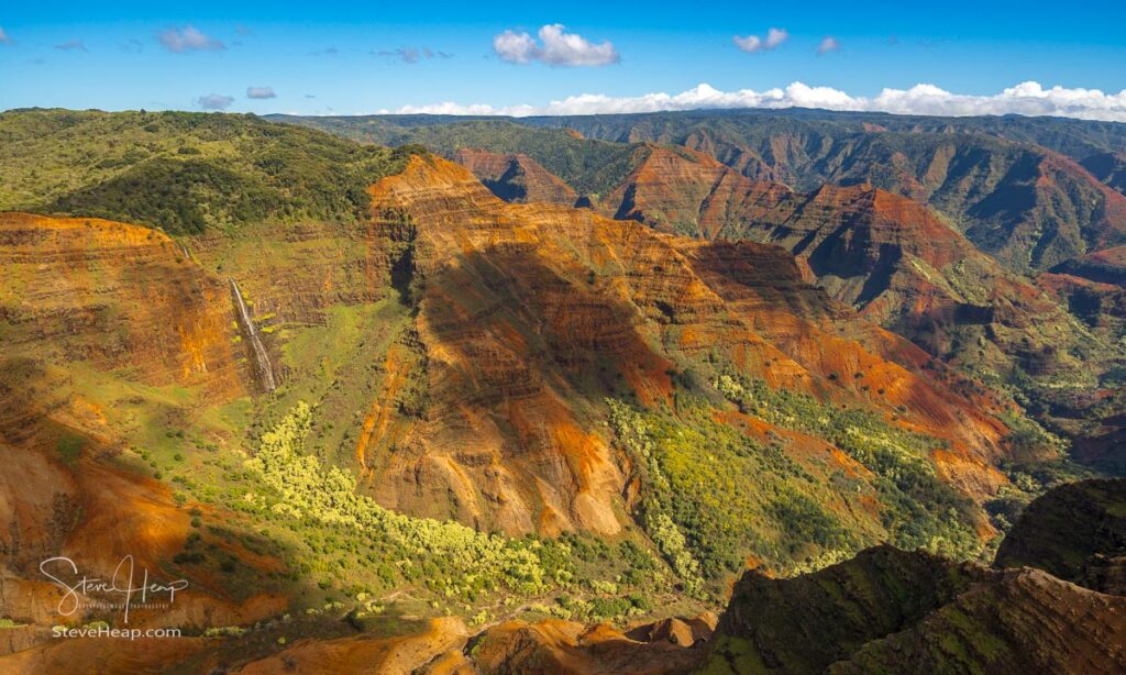 Aerial view of Waipo'o waterfall and landscape of Waimea Canyon of Kauai from helicopter flight. Prints available here