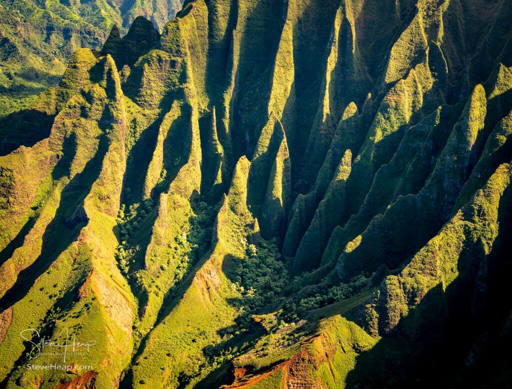 Aerial view of Na Pali mountains and landscape of Hawaiian island of Kauai from helicopter flight. Prints available here