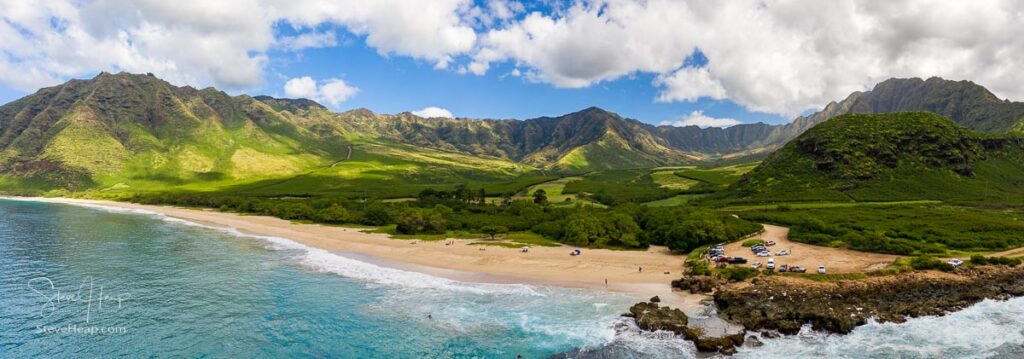 Broad panorama of Makua beach and valley from aerial view over the ocean on west coast of Oahu, Hawaii. Prints available here