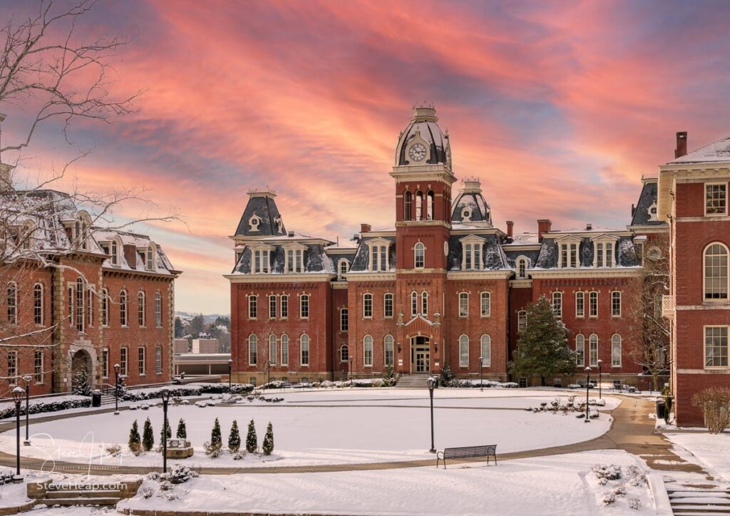Dramatic image of a sunset over Woodburn Hall at West Virginia University or WVU in Morgantown WV after a snow fall. Prints available here