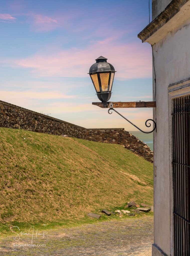 Traditional street lantern at dusk in Colonia del Sacramento