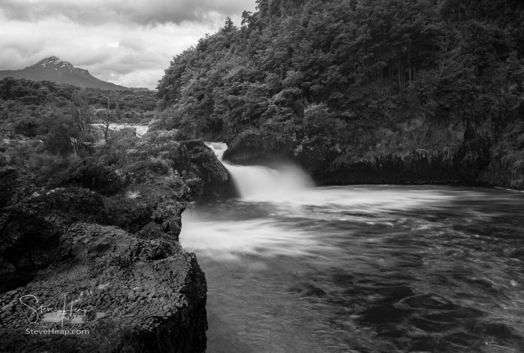 Black and white view of river cascading down Petrohue Falls by the Osorno volcano in Chile