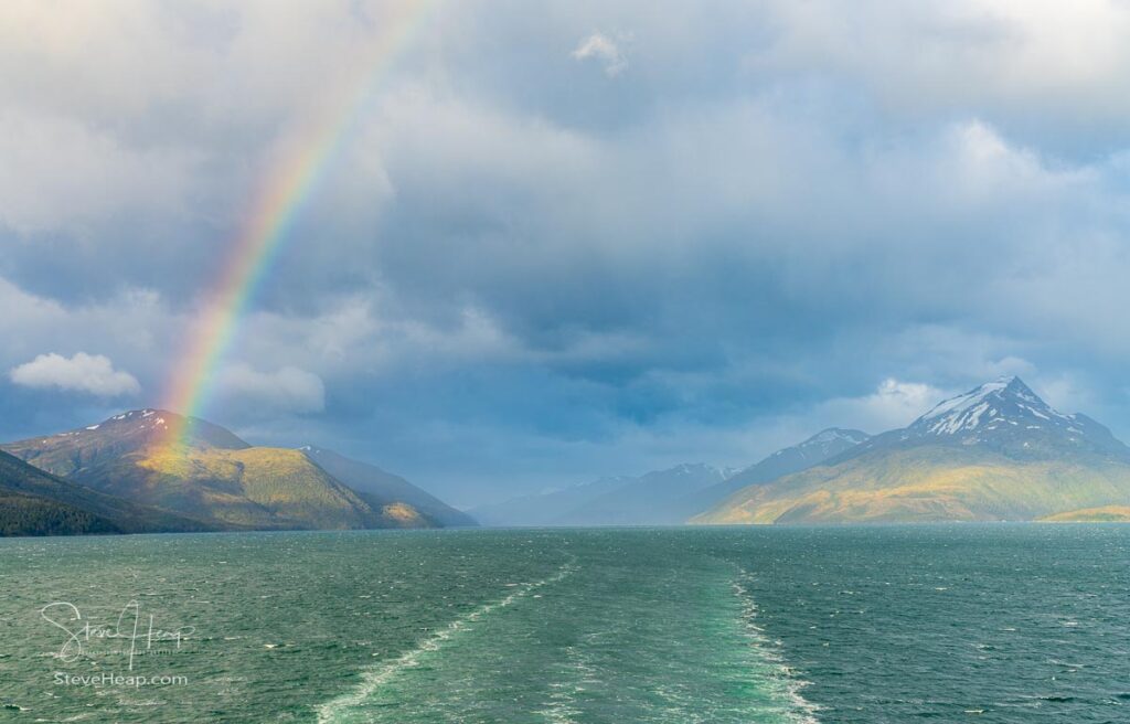 Panorama of Glacier Alley of Beagle channel in Chile from cruise ship with rainbow