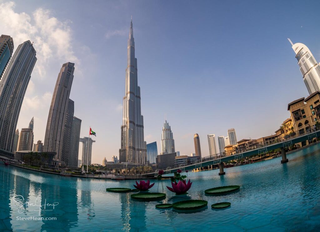 Skyline of Dubai downtown business district above the Burj Khalifa lake with fisheye lens. Prints in my online store