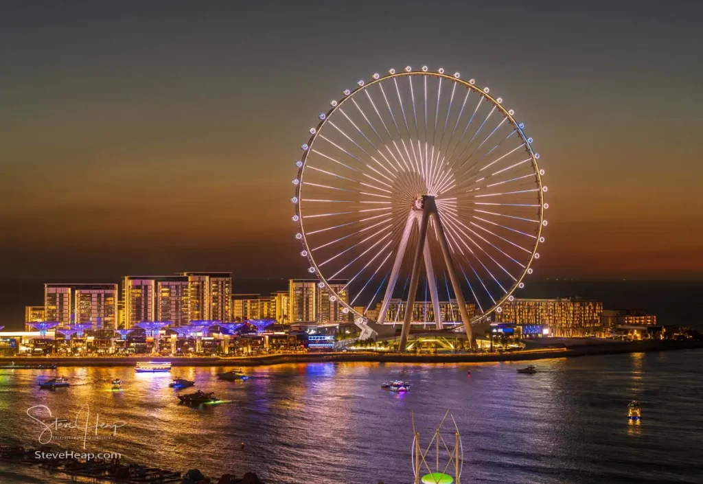 The sun has now set behind the Ain Dubai Observation Wheel on Bluewater Island seen from JBR Beach