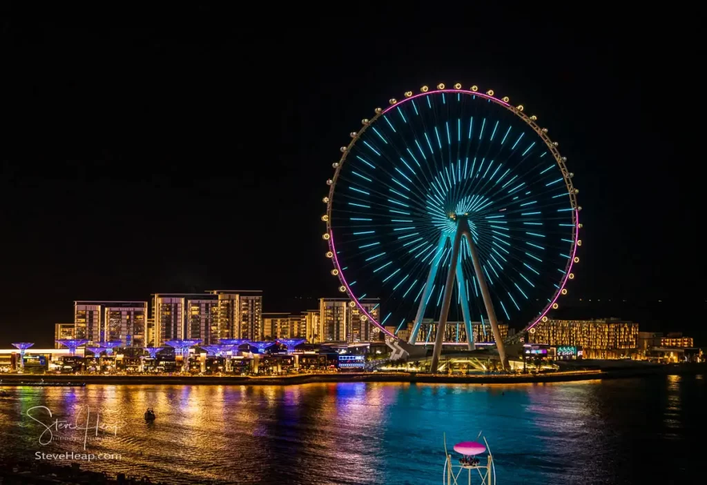 The light show on the Ain Dubai Observation Wheel on Bluewater Island seen from JBR Beach