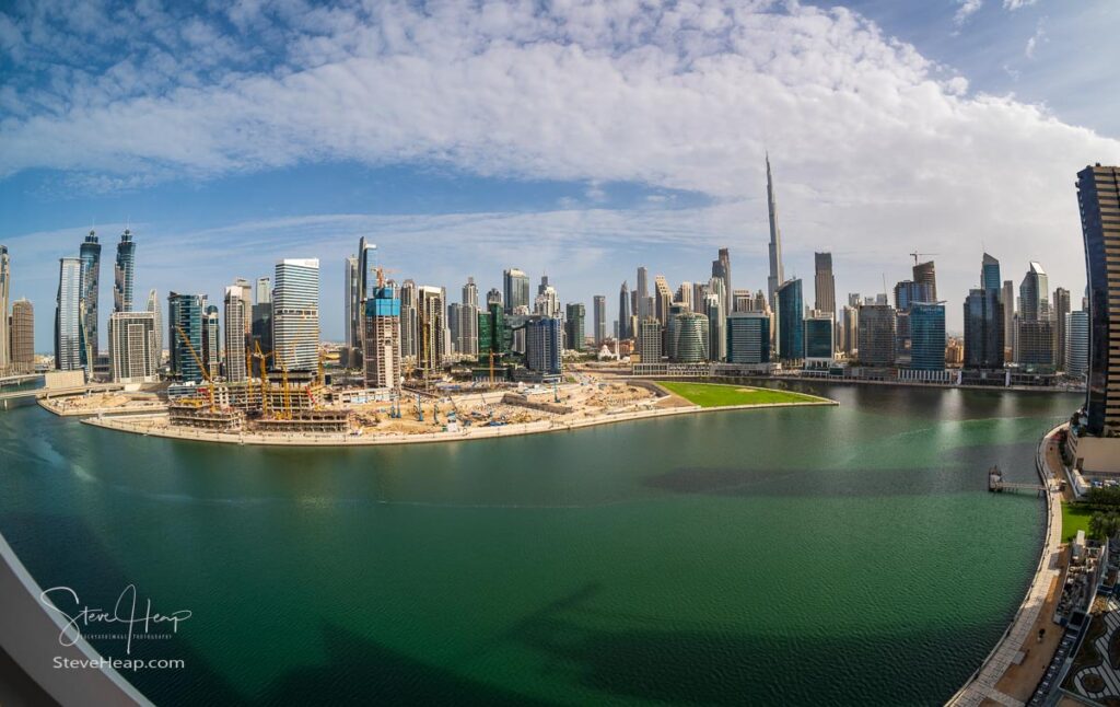 Dubai, UAE - April 2, 2023: Skyline of construction of downtown district from apartment in Business Bay