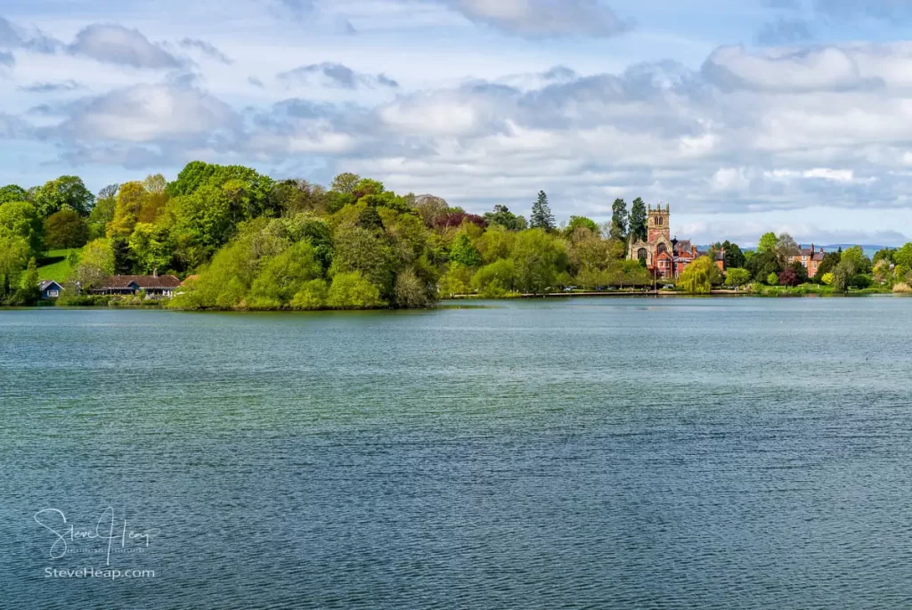 Broad panorama of the town of Ellesmere seen from across the Mere