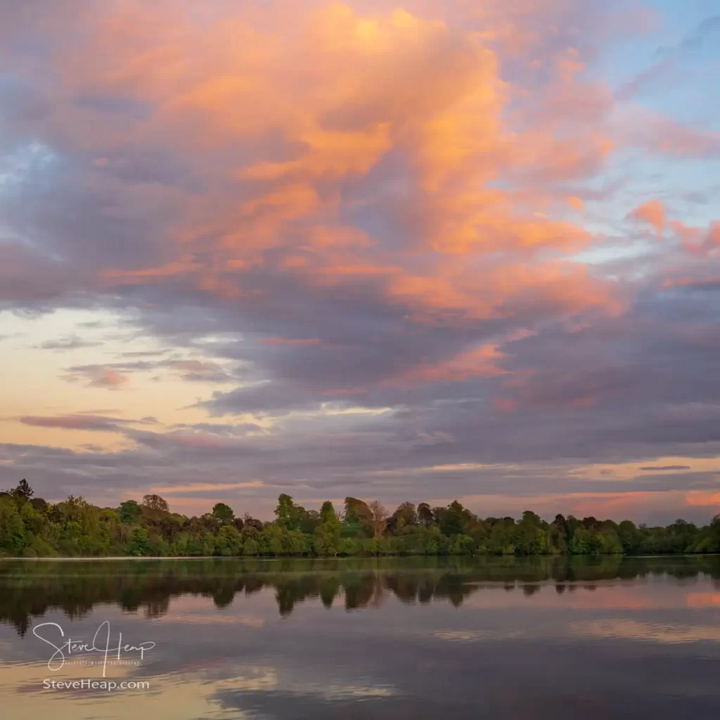 Dramatic sunset over the Mere in Ellesmere on a calm evening
