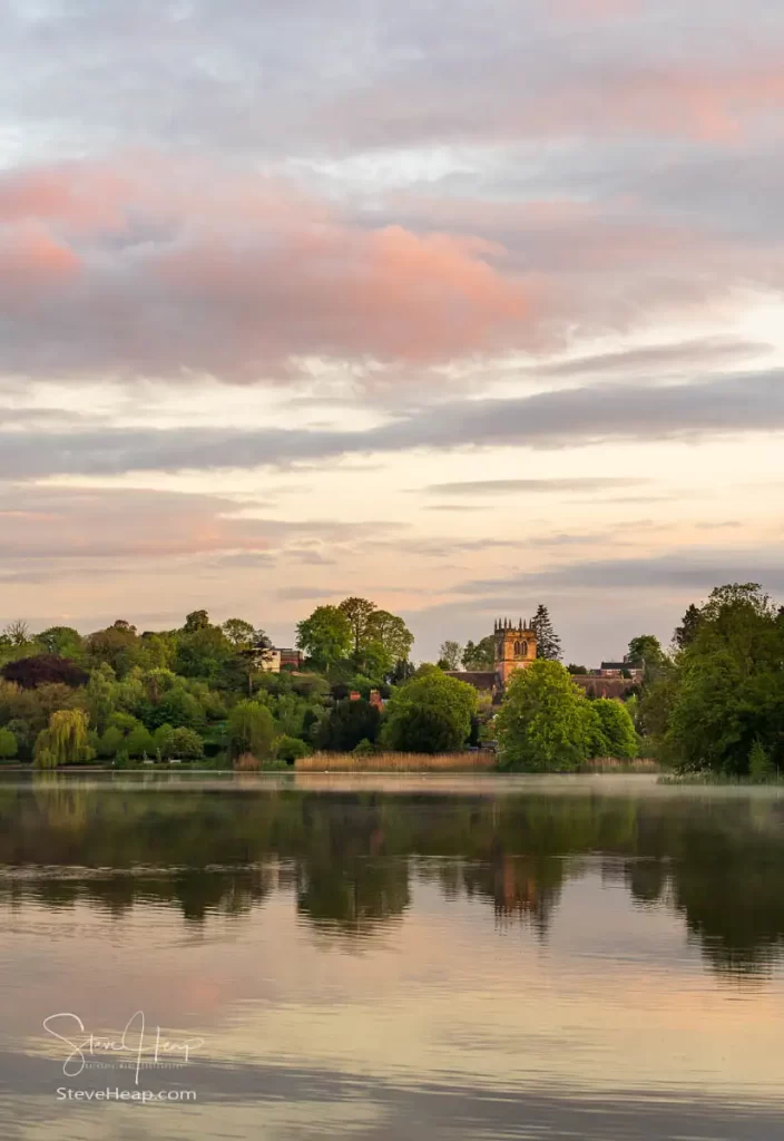 Sunset over the Parish Church of St Mary's in Ellesmere from the Mere