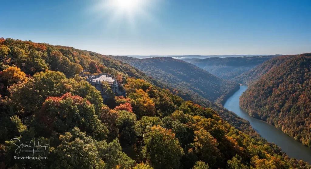 Sun rising over the distant hills of West Virginia and the Cheat River Gorge. Prints available from Pictorem and Fine Art America