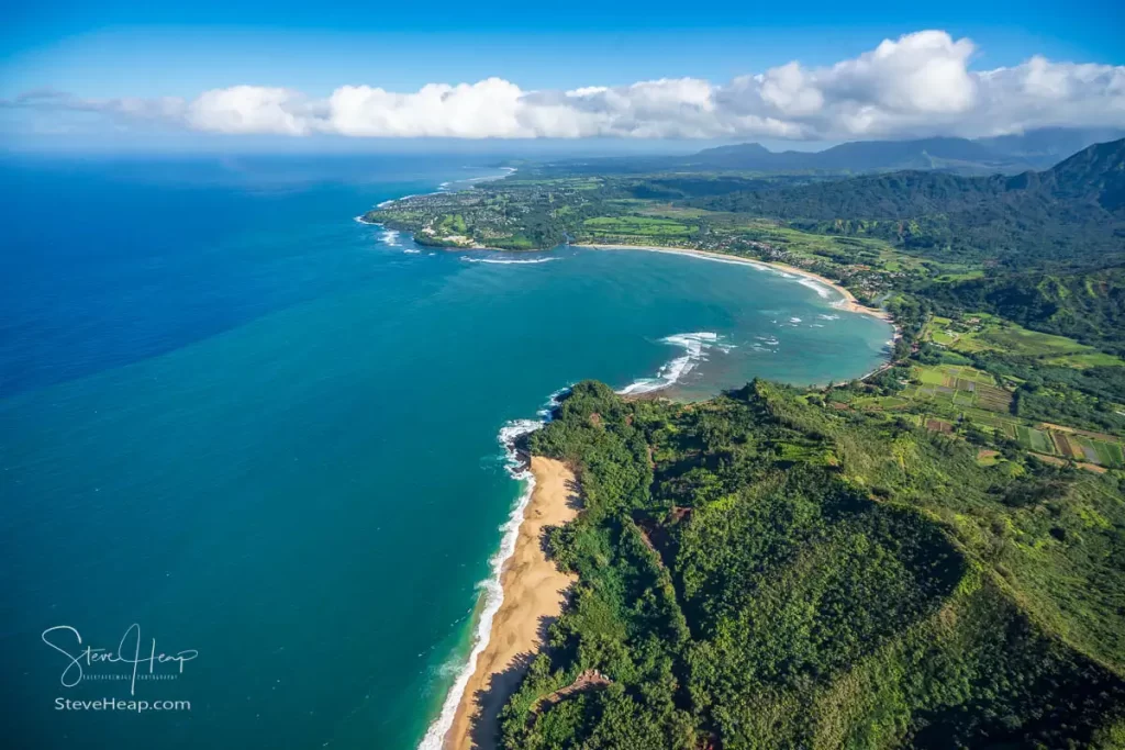 Helicopter view of Lumahai Beach looking toward Hanalei and Princeville on Kauai. Prints available in my store
