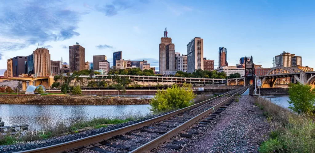 Panorama of the skyline of St Paul, Minnesota at sunrise with the railway bridge crossing the Mississippi river. Prints available in my online store